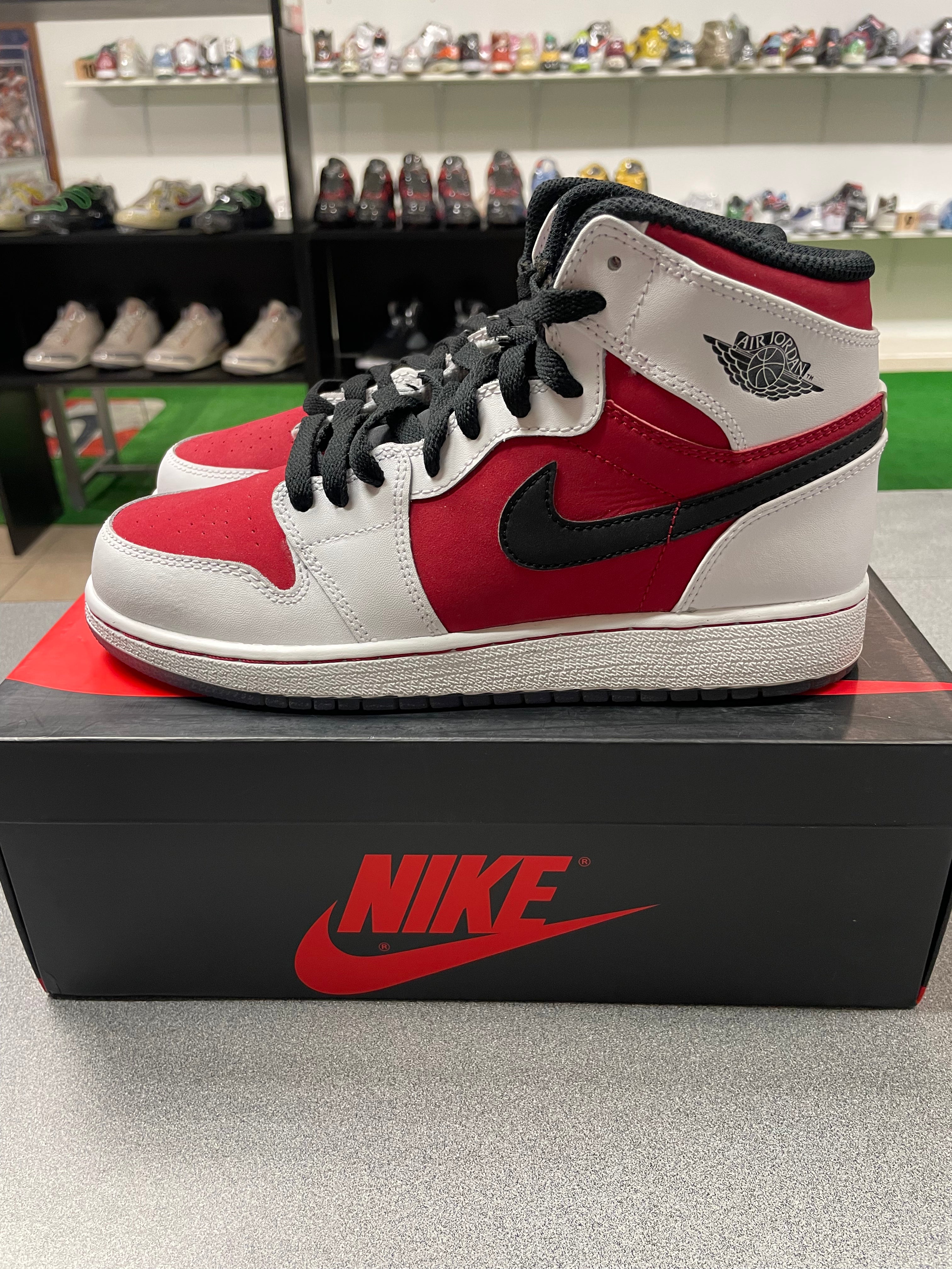 Pre owned Nike Air Jordan 1 High Carmine Grade school shoes with og box